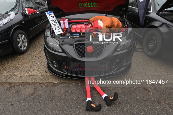 KRAKOW, POLAND - DECEMBER 08: Christmas decorations seen of cars parked outside the Pediatric Hospital in Krakow as Santa Clauses deliver Ch...