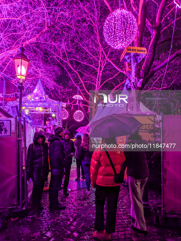 The Pink Christmas market at Stephansplatz in Munich, Bavaria, Germany, on December 8, 2024, lights up in its signature pink hues. Known as...