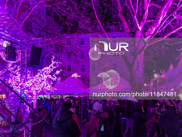 The Pink Christmas market at Stephansplatz in Munich, Bavaria, Germany, on December 8, 2024, lights up in its signature pink hues. Known as...