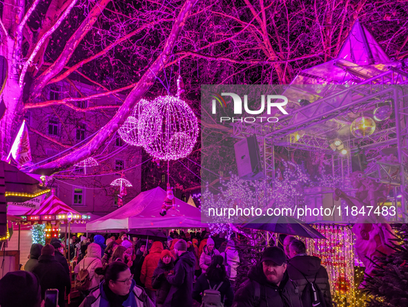 The Pink Christmas market at Stephansplatz in Munich, Bavaria, Germany, on December 8, 2024, lights up in its signature pink hues. Known as...