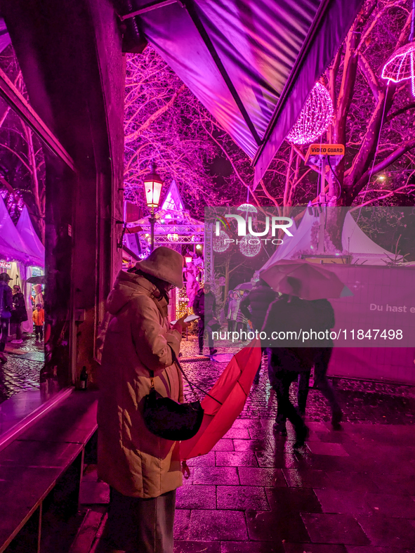 The Pink Christmas market at Stephansplatz in Munich, Bavaria, Germany, on December 8, 2024, lights up in its signature pink hues. Known as...