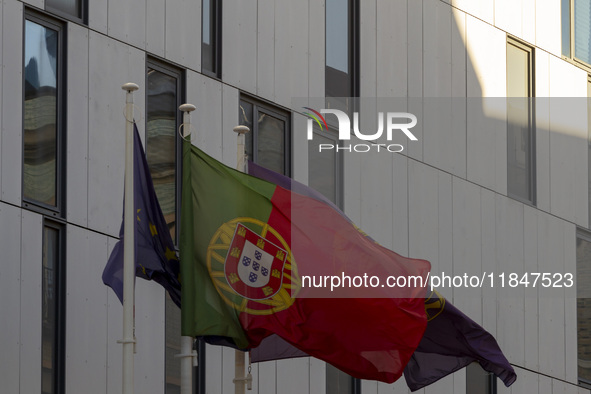 A Portugal flag moves in the wind at the Judiciary Police Headquarters in Lisbon, Portugal, on December 8, 2024. The Judiciary Police (PJ) c...