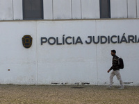 A person walks by the Judiciary Police Headquarters in Lisbon, Portugal, on December 8, 2024. The Judiciary Police (PJ) carry out a major op...