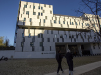 In Lisbon, Portugal, on December 8, 2024, people walk by the Judiciary Police Headquarters. The Judiciary Police (PJ) carry out a major oper...