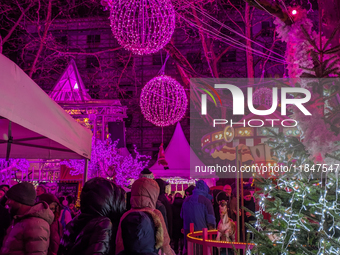 The Pink Christmas market at Stephansplatz in Munich, Bavaria, Germany, on December 8, 2024, lights up in its signature pink hues. Known as...