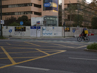 A food delivery person rides a bike in Lisbon, Portugal, on December 8, 2024. Glovo, the app-based food delivery service, hires its freelanc...