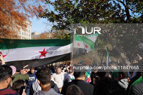 Syrian opposition supporters gather in Lafayette Park next to the White House to celebrate the fall of Bashar al-Assad on December 8, 2024 