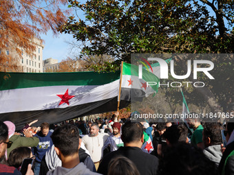 Syrian opposition supporters gather in Lafayette Park next to the White House to celebrate the fall of Bashar al-Assad on December 8, 2024 (