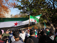 Syrian opposition supporters gather in Lafayette Park next to the White House to celebrate the fall of Bashar al-Assad on December 8, 2024 (