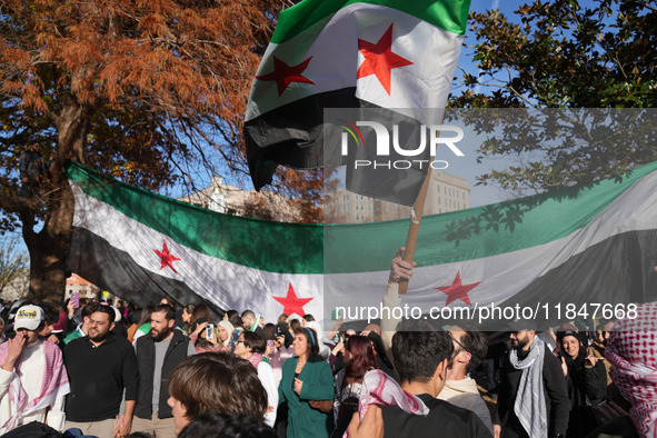 Syrian opposition supporters gather in Lafayette Park next to the White House to celebrate the fall of Bashar al-Assad on December 8, 2024 