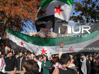 Syrian opposition supporters gather in Lafayette Park next to the White House to celebrate the fall of Bashar al-Assad on December 8, 2024 (