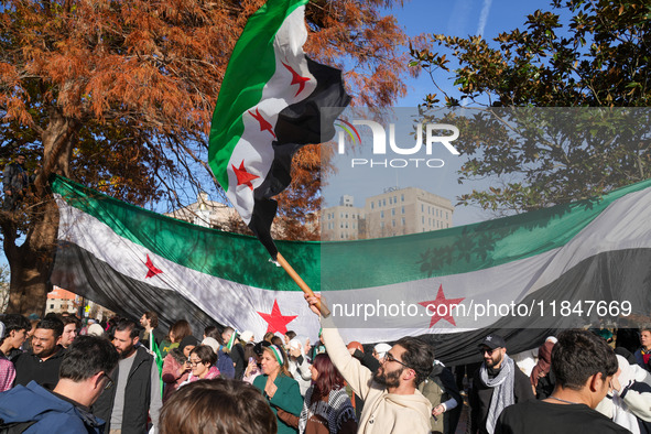 Syrian opposition supporters gather in Lafayette Park next to the White House to celebrate the fall of Bashar al-Assad on December 8, 2024 