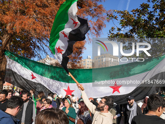 Syrian opposition supporters gather in Lafayette Park next to the White House to celebrate the fall of Bashar al-Assad on December 8, 2024 (