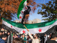 Syrian opposition supporters gather in Lafayette Park next to the White House to celebrate the fall of Bashar al-Assad on December 8, 2024 (