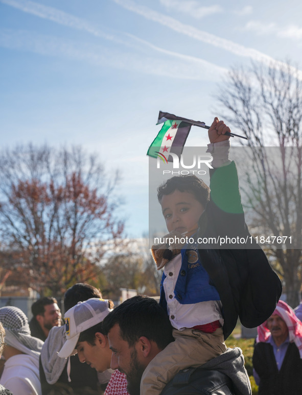 Syrian opposition supporters gather in Lafayette Park next to the White House to celebrate the fall of Bashar al-Assad on December 8, 2024 