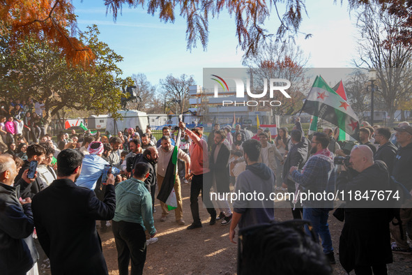 Syrian opposition supporters gather in Lafayette Park next to the White House to celebrate the fall of Bashar al-Assad on December 8, 2024 