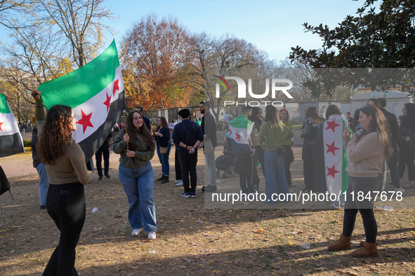 Syrian opposition supporters gather in Lafayette Park next to the White House to celebrate the fall of Bashar al-Assad on December 8, 2024 