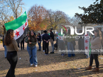 Syrian opposition supporters gather in Lafayette Park next to the White House to celebrate the fall of Bashar al-Assad on December 8, 2024 (