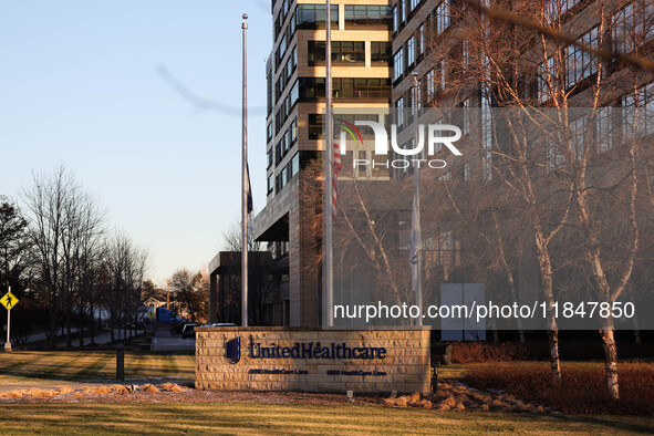 The front of the UnitedHealthcare corporate headquarters in Minnetonka, Minnesota, on December 5, 2024, shows flags flying at half-mast for...