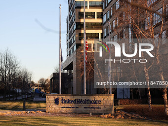 The front of the UnitedHealthcare corporate headquarters in Minnetonka, Minnesota, on December 5, 2024, shows flags flying at half-mast for...