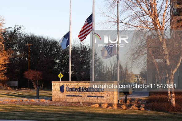 The front of the UnitedHealthcare corporate headquarters in Minnetonka, Minnesota, on December 5, 2024, shows flags flying at half-mast for...