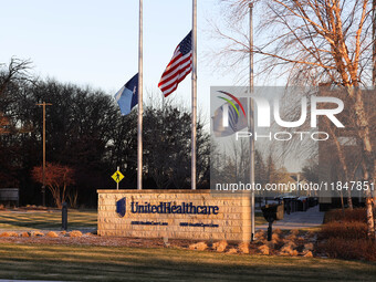 The front of the UnitedHealthcare corporate headquarters in Minnetonka, Minnesota, on December 5, 2024, shows flags flying at half-mast for...