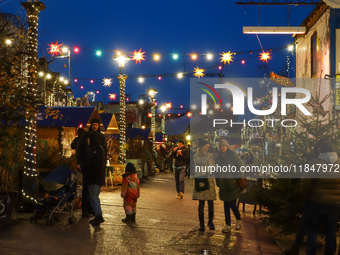 The Christmas Market Moonlight Express with its Winter Festival at Bahnwarter Thiel in Munich, Bavaria, Germany, on December 8, 2024, runs f...