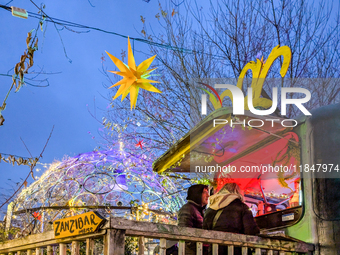 The Christmas Market Moonlight Express with its Winter Festival at Bahnwarter Thiel in Munich, Bavaria, Germany, on December 8, 2024, runs f...