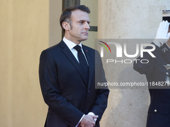 France's President Emmanuel Macron waits before the bilateral talks with the United States President-elect Donald Trump in Paris, France, on...