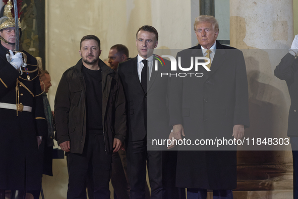 France's President Emmanuel Macron, the United States President-elect Donald Trump, and the Ukrainian President Volodymyr Zelensky leave the...