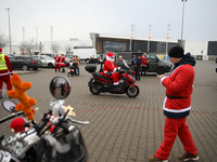 Motorcyclists in Santa Claus costumes get ready for the parade at EXPO Krakow in Krakow, Poland, on December 8, 2024. Santas on motorbikes r...