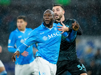 Romelu Lukaku of SSC Napoli and Mario Gila of SS Lazio compete for the ball during the serie Serie A Enilive match between SSC Napoli and SS...