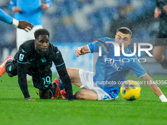 Alessandro Buongiorno of SSC Napoli and Boulaye Dia of SS Lazio compete for the ball during the serie Serie A Enilive match between SSC Napo...