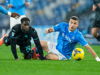 Alessandro Buongiorno of SSC Napoli and Boulaye Dia of SS Lazio compete for the ball during the serie Serie A Enilive match between SSC Napo...