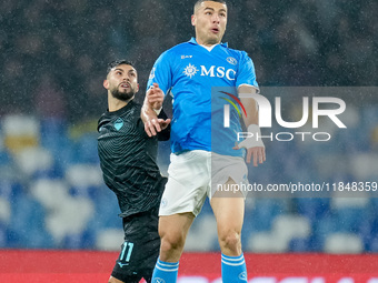 Alessandro Buongiorno of SSC Napoli and Taty Castellanos of SS Lazio compete for the ball during the serie Serie A Enilive match between SSC...