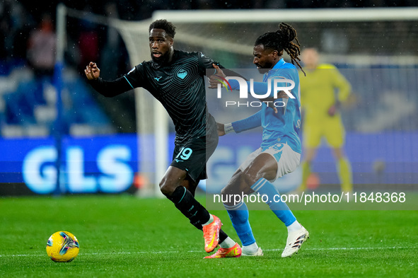 Boulaye Dia of SS Lazio and Andre-Frank Zambo Anguissa of SSC Napoli compete for the ball during the serie Serie A Enilive match between SSC...