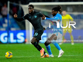 Boulaye Dia of SS Lazio and Andre-Frank Zambo Anguissa of SSC Napoli compete for the ball during the serie Serie A Enilive match between SSC...