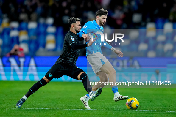 Khvicha Kvaratskhelia of SSC Napoli and Taty Castellanos of SS Lazio compete for the ball during the serie Serie A Enilive match between SSC...