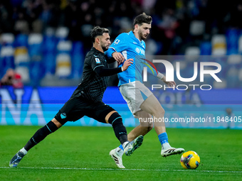 Khvicha Kvaratskhelia of SSC Napoli and Taty Castellanos of SS Lazio compete for the ball during the serie Serie A Enilive match between SSC...