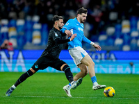 Khvicha Kvaratskhelia of SSC Napoli and Taty Castellanos of SS Lazio compete for the ball during the serie Serie A Enilive match between SSC...