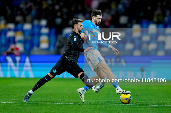 Khvicha Kvaratskhelia of SSC Napoli and Taty Castellanos of SS Lazio compete for the ball during the serie Serie A Enilive match between SSC...