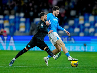 Khvicha Kvaratskhelia of SSC Napoli and Taty Castellanos of SS Lazio compete for the ball during the serie Serie A Enilive match between SSC...