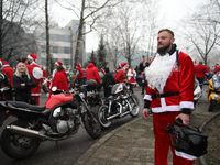 In Krakow, Poland, on December 8, 2024, motorcyclists in Santa costumes hand out gifts at the University Children's Hospital. Santas on moto...