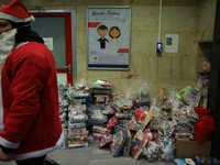 In Krakow, Poland, on December 8, 2024, motorcyclists in Santa costumes hand out gifts at the University Children's Hospital. Santas on moto...