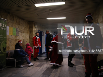 In Krakow, Poland, on December 8, 2024, motorcyclists in Santa costumes hand out gifts at the University Children's Hospital. Santas on moto...