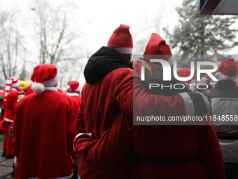 In Krakow, Poland, on December 8, 2024, motorcyclists in Santa costumes hand out gifts at the University Children's Hospital. Santas on moto...