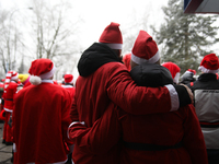 In Krakow, Poland, on December 8, 2024, motorcyclists in Santa costumes hand out gifts at the University Children's Hospital. Santas on moto...