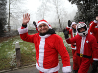 Motorcyclists in Santa costumes greet sick children while handing out gifts at the University Children's Hospital in Krakow, Poland, on Dece...