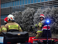 In Krakow, Poland, on December 8, 2024, the Volunteer Fire Department greets sick children while handing out gifts at the University Childre...