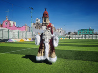 Miguel Moctezuma is characterized as Santa Claus Illuminated during his visit to some of the iconic places in the Tepito neighborhood as par...